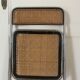 Vintage folding chair in metal and cane.