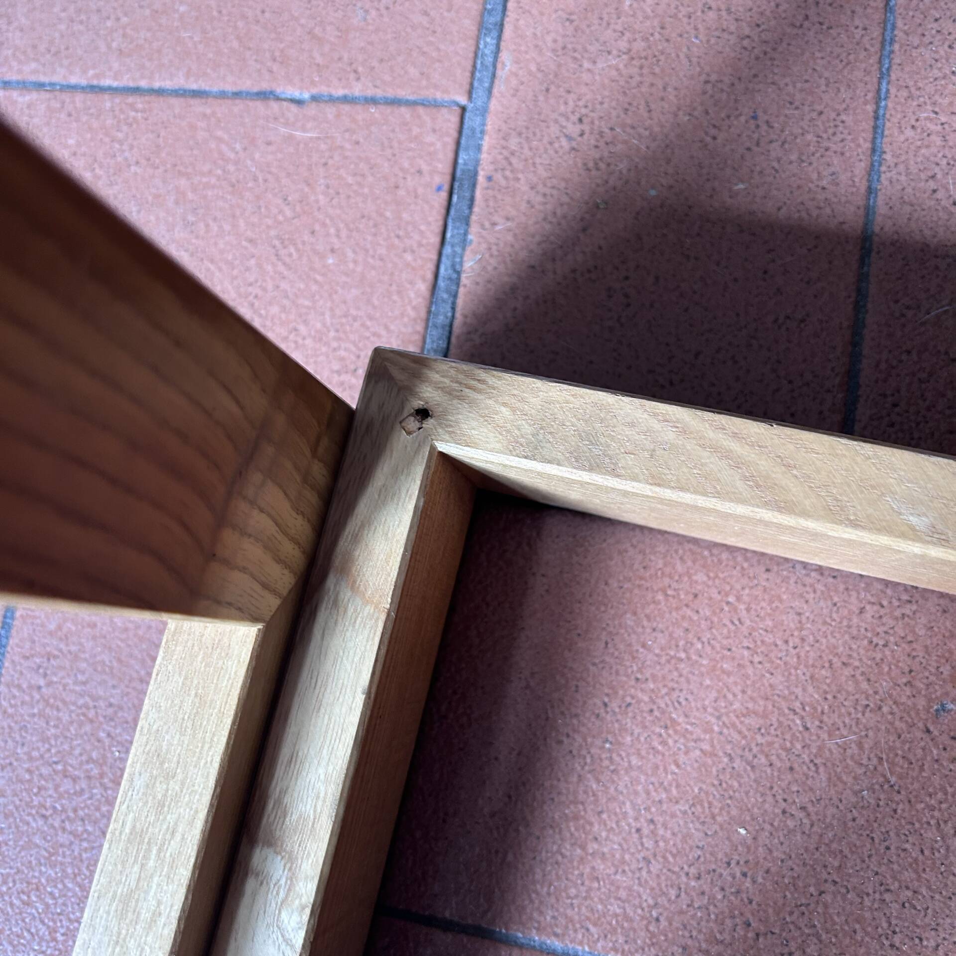 Modernist side table in wood and smoked glass