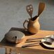 Pair of salad servers or kitchen utensils in blackened teak L30 D9