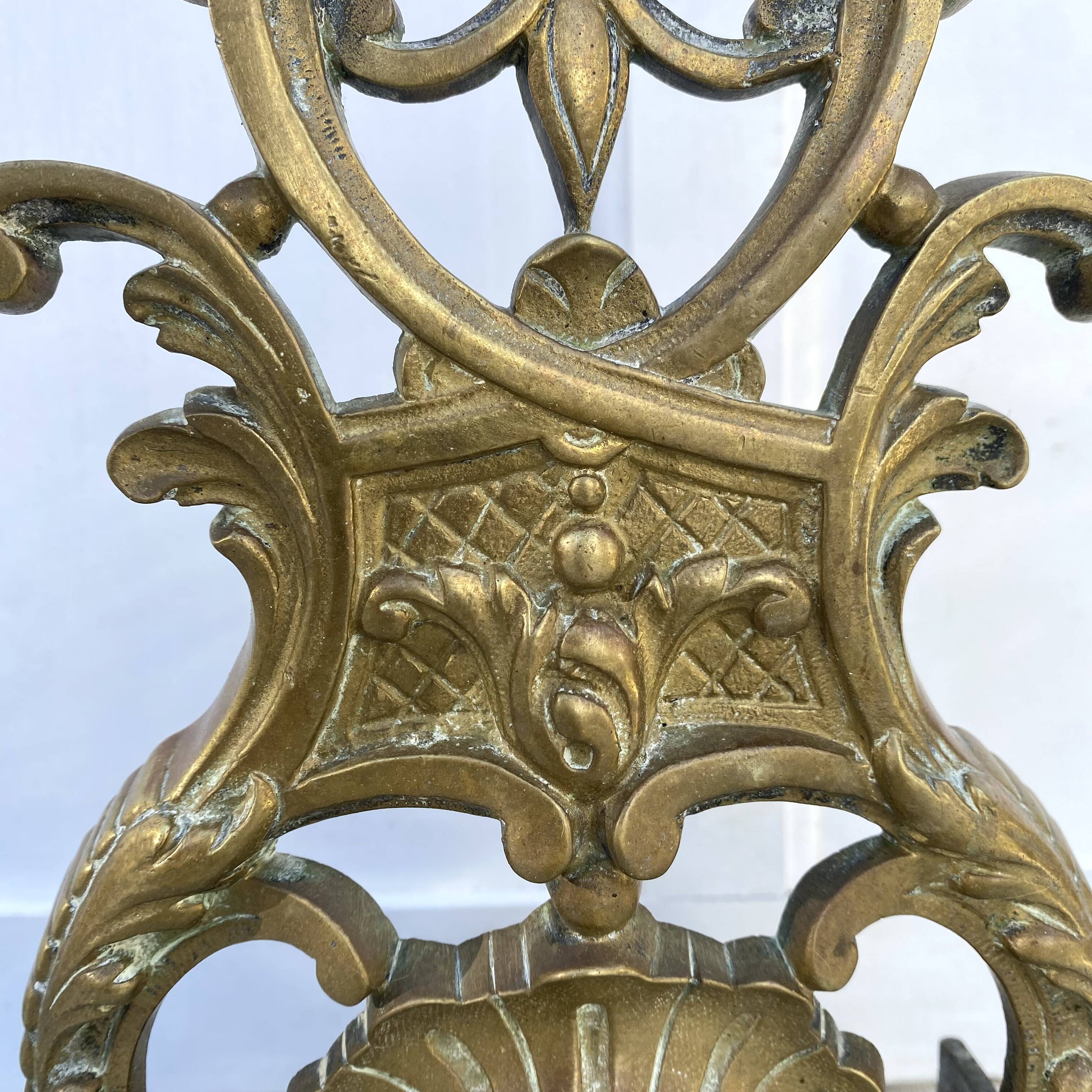 Antique brass fireplace set, bar and andirons, Napoleon I style.