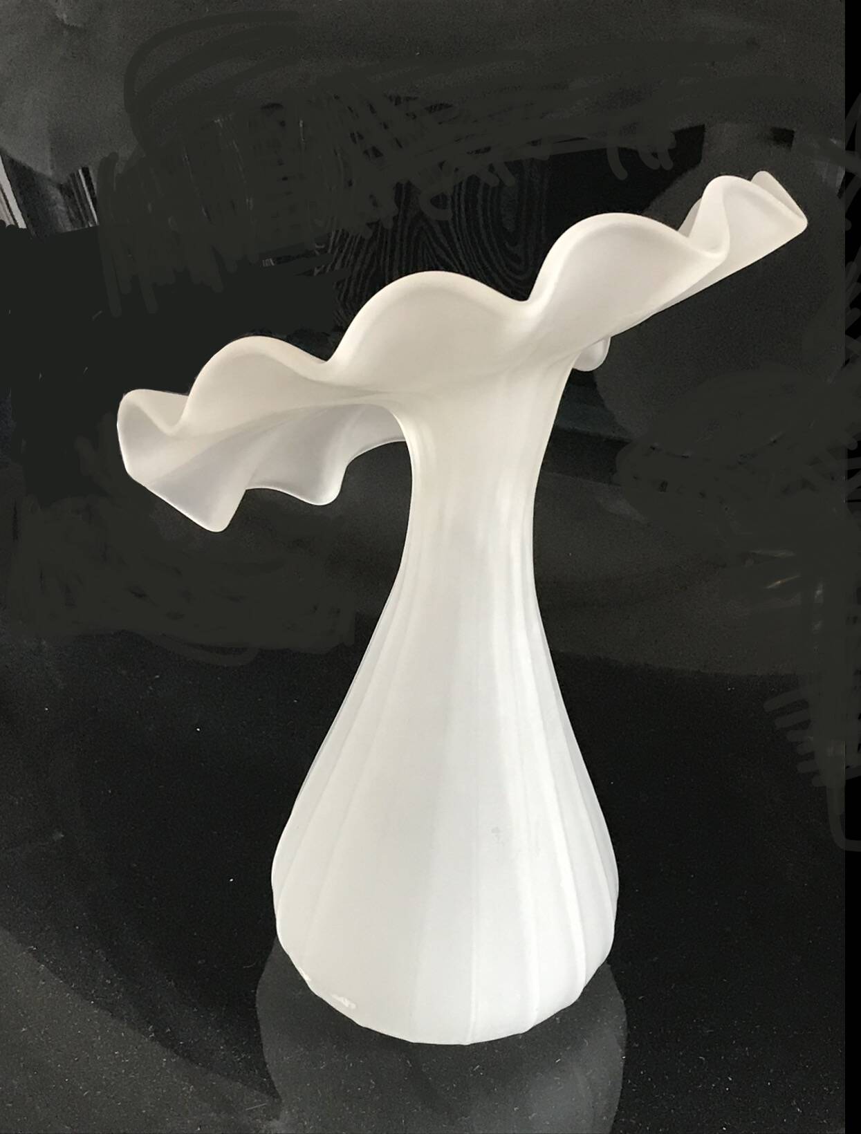 Vintage satin white glass vase with a wavy corolla
