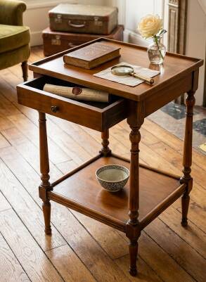 Small side table in Louis Philippe style with a patinated wood finish.