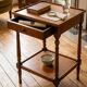 Small side table in Louis Philippe style with a patinated wood finish.