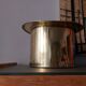 Champagne bucket hat in gilded brass