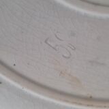 Plat rond en terre de fer