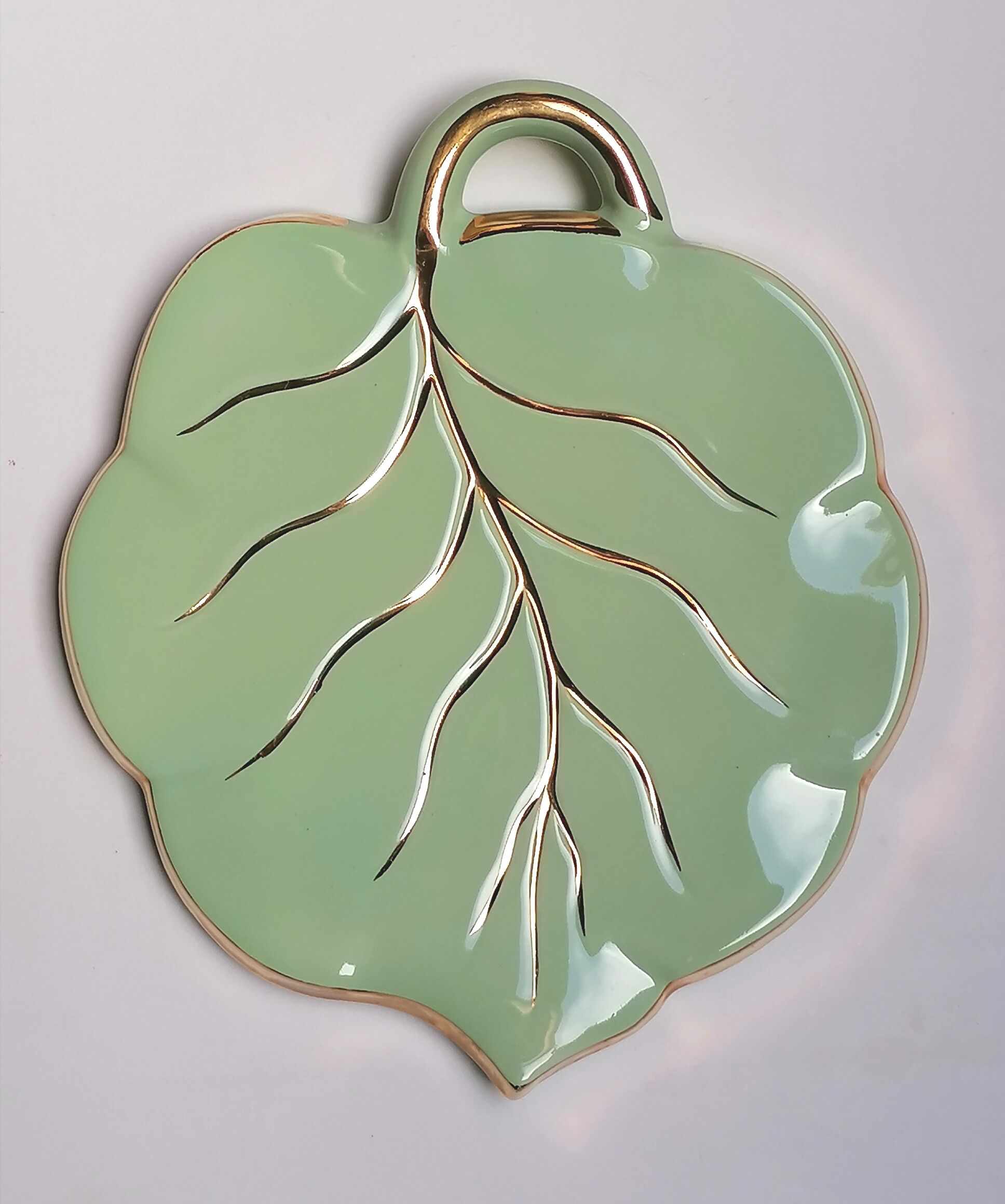 Celadon green leaf trivety and gilding
