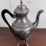 Empire style silver-plated verseuse, resting on three sculpted feet.