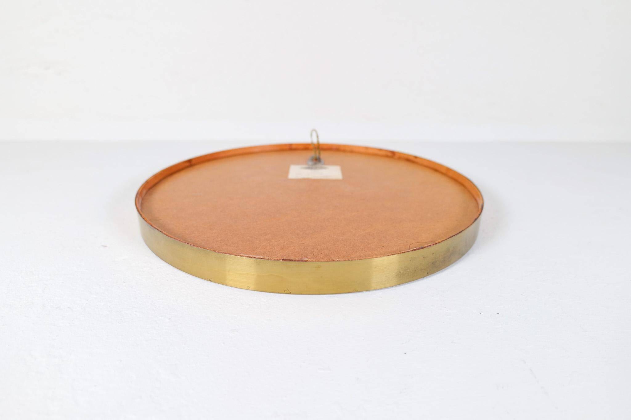 Round brass mirror from the mid-century by Glasmäster in Markaryd, Sweden, 1960s.