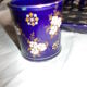 Set of tableware and its earthenware vases