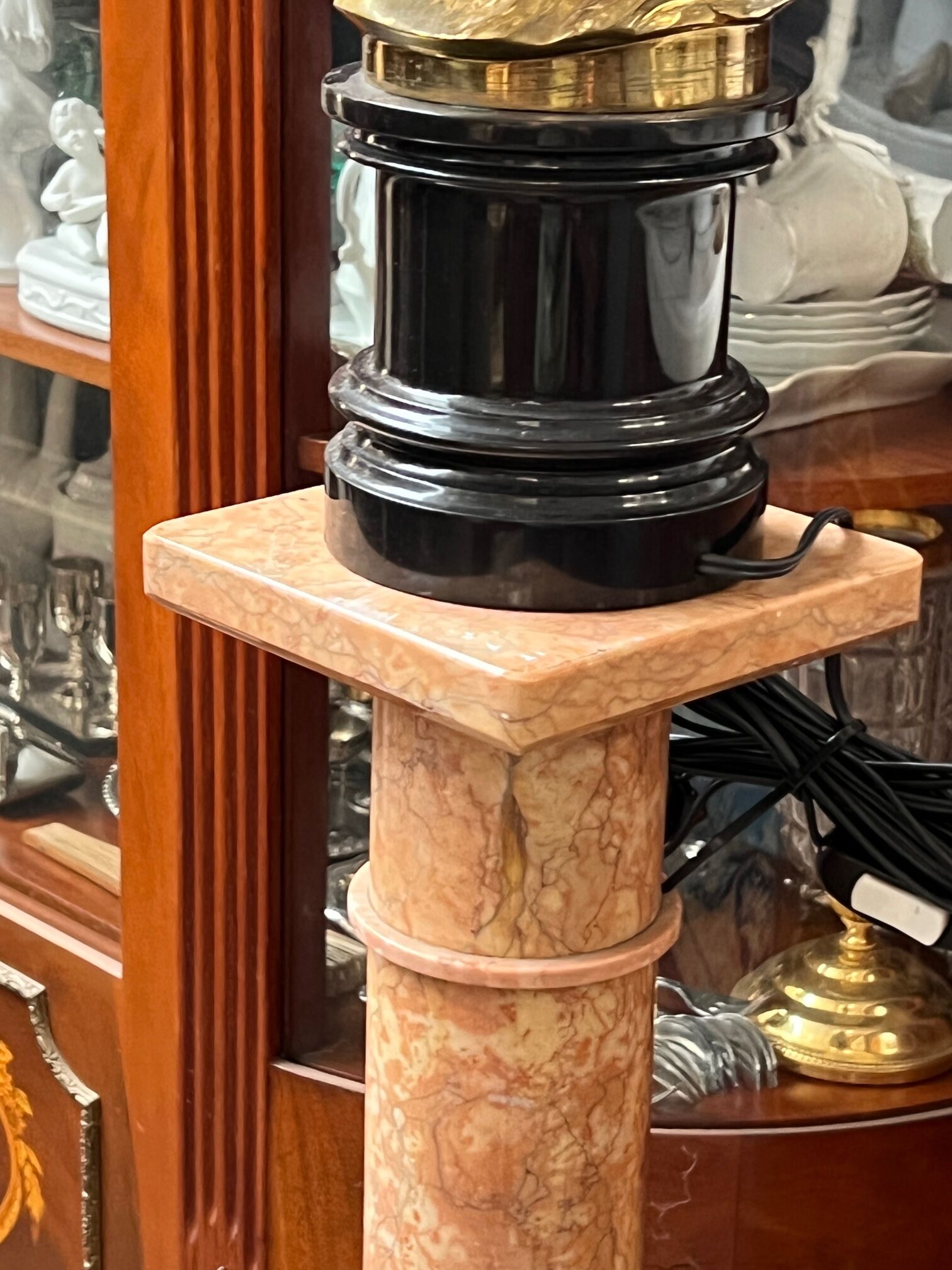 Table lamp made of solid bronze on a marble base.