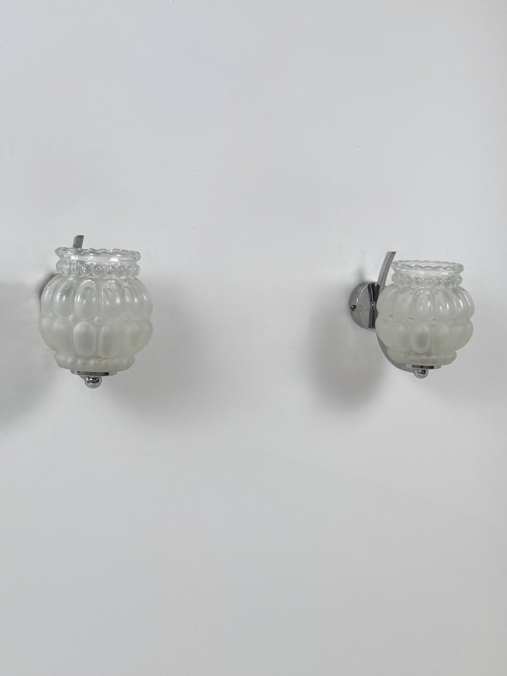 Pair of vintage chrome metal and bubble glass wall lights, France, 1950.