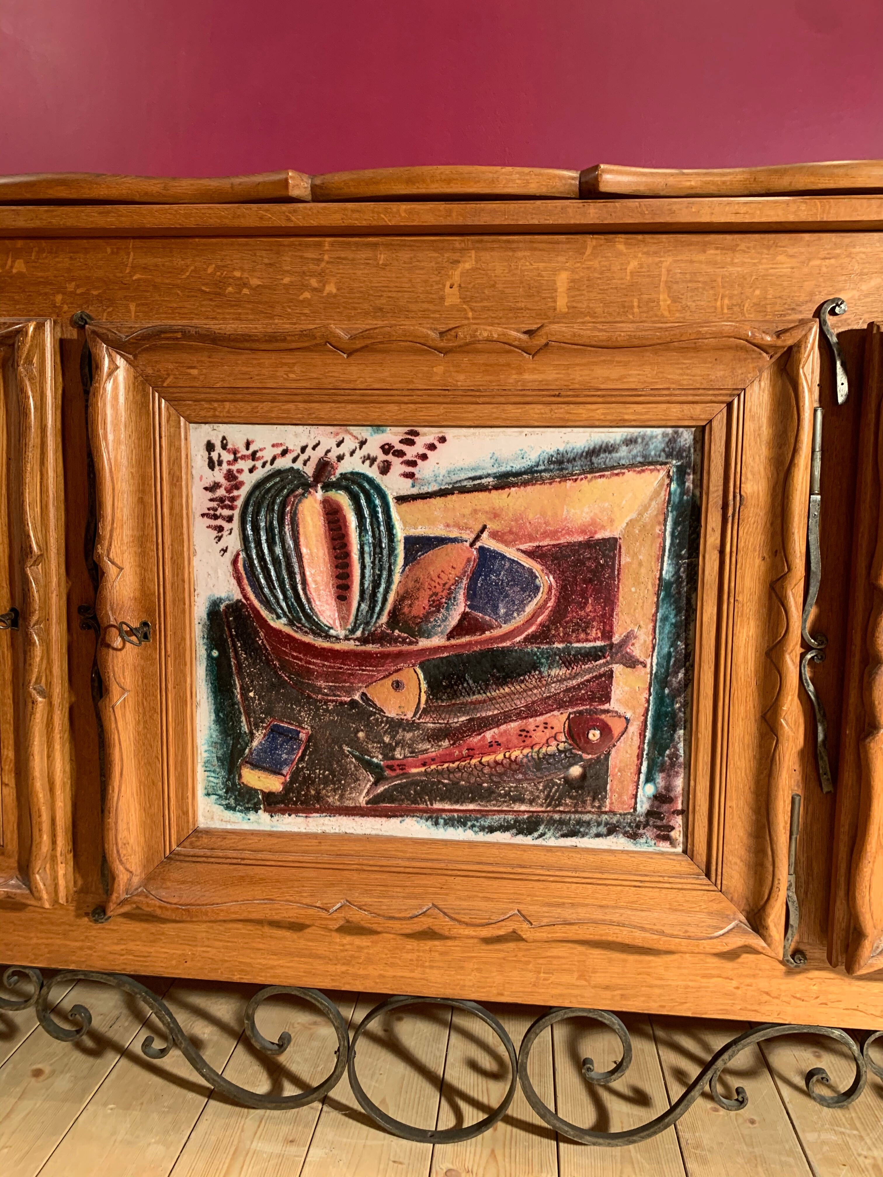 Modernist wood and ceramics sideboard of the 1950s