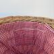 Basket in vintage woven wicker and red gingham