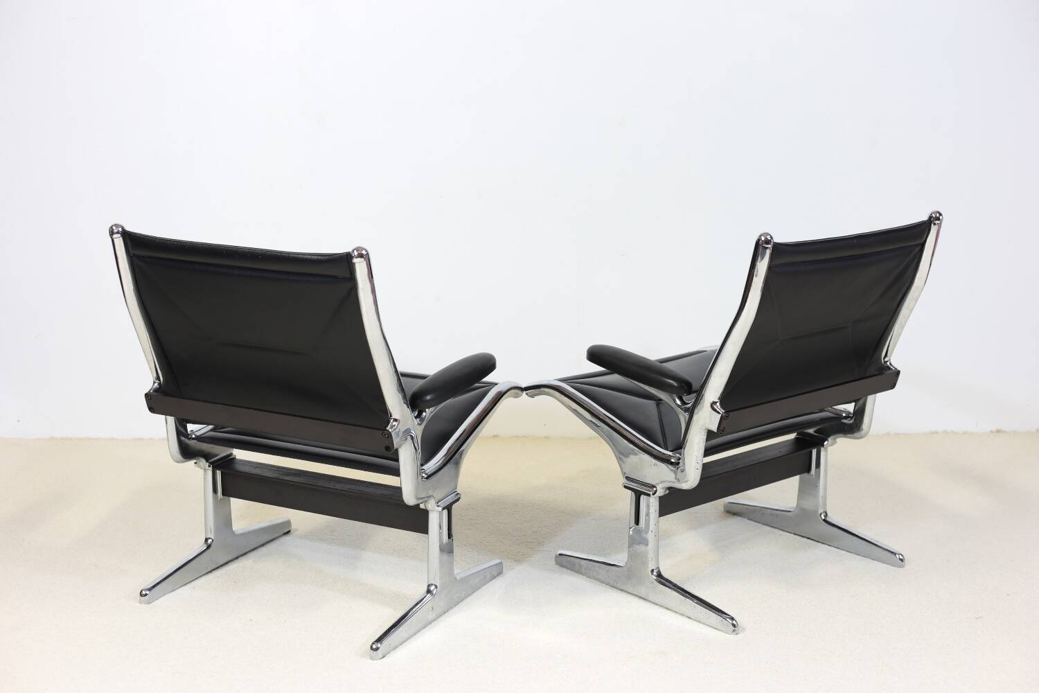 Pair of Eames Sling Tandem armchairs