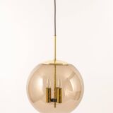 Large Limburg pendant light in brass with smoked glass ball, Germany, 1970s.