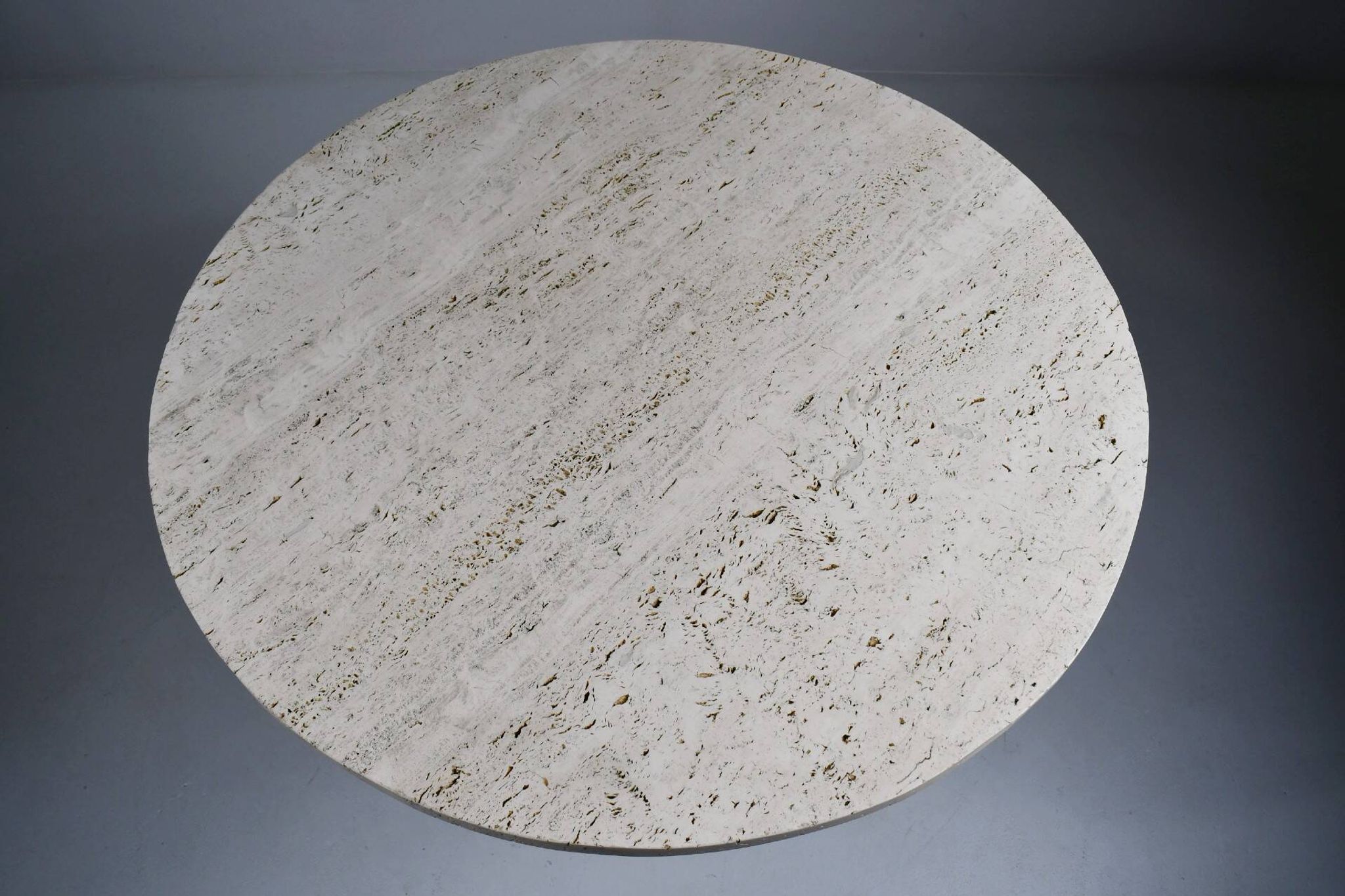 Vintage travertine bistro/dining table with metal base. (B)