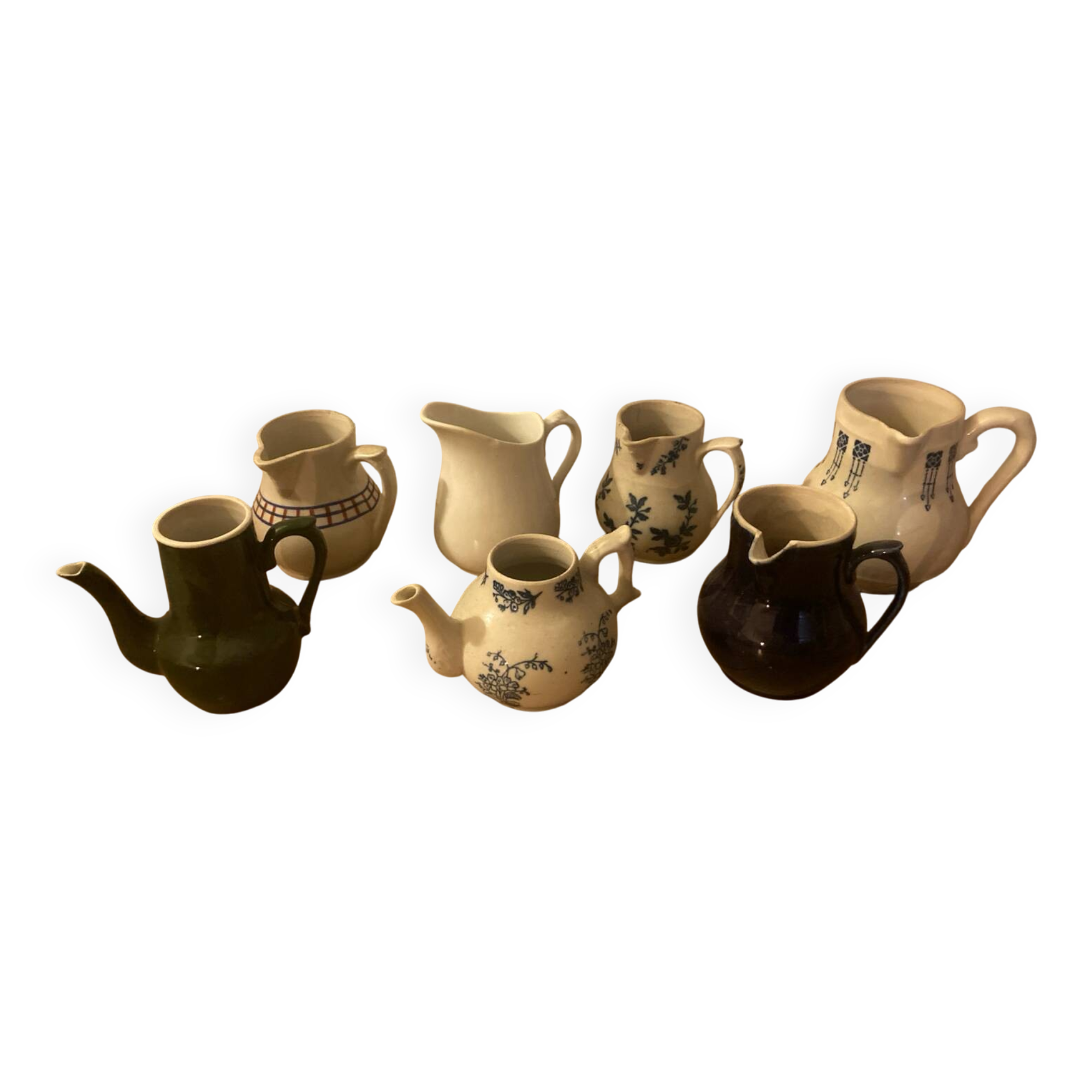 During antique milk jugs at a flea market.