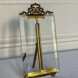 Frame in brass and beveled glass