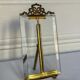 Frame in brass and beveled glass