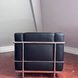 Black leather designer armchair – an elegant piece
