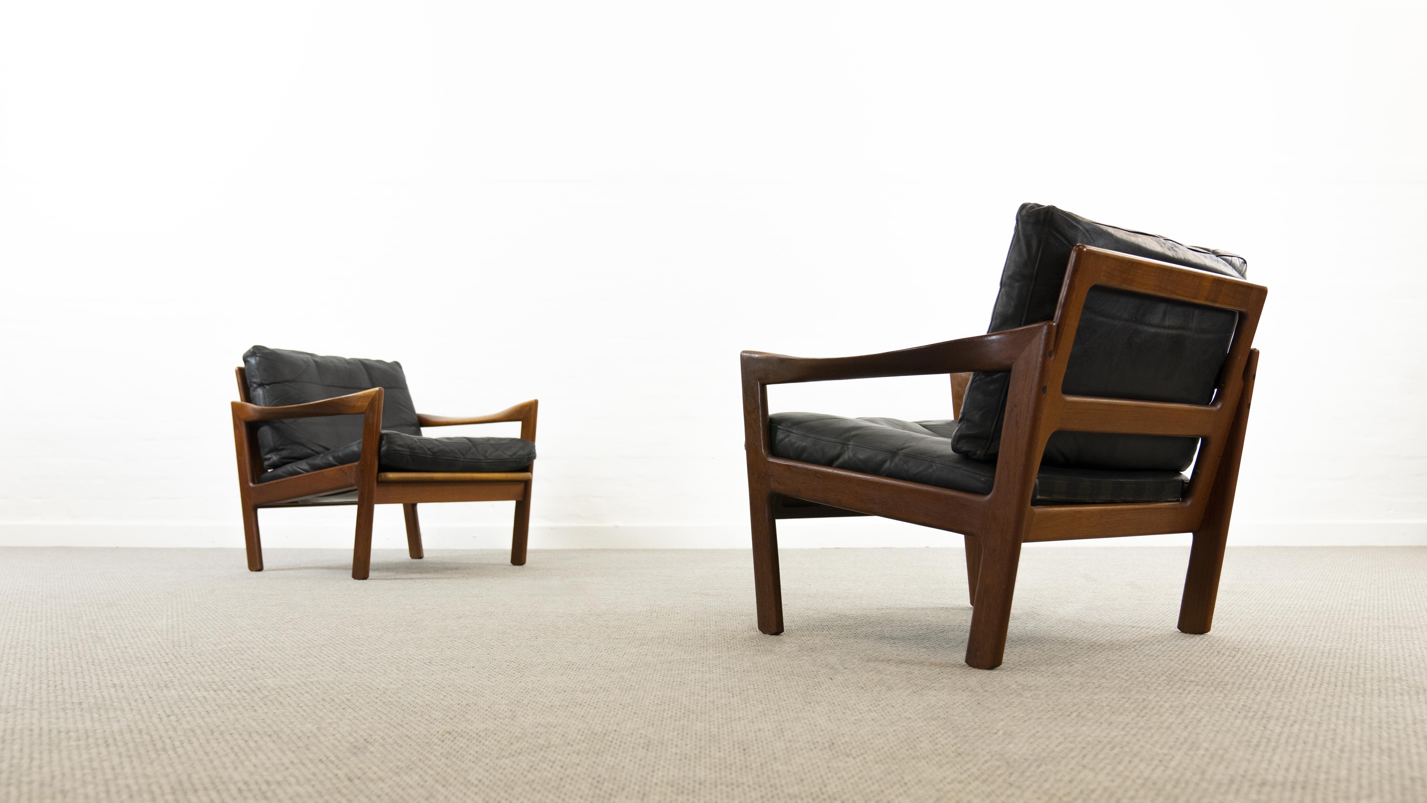 Pair of teak chairs in black leather by Illum Wikkelsoe for Niels Eilersen, Denmark