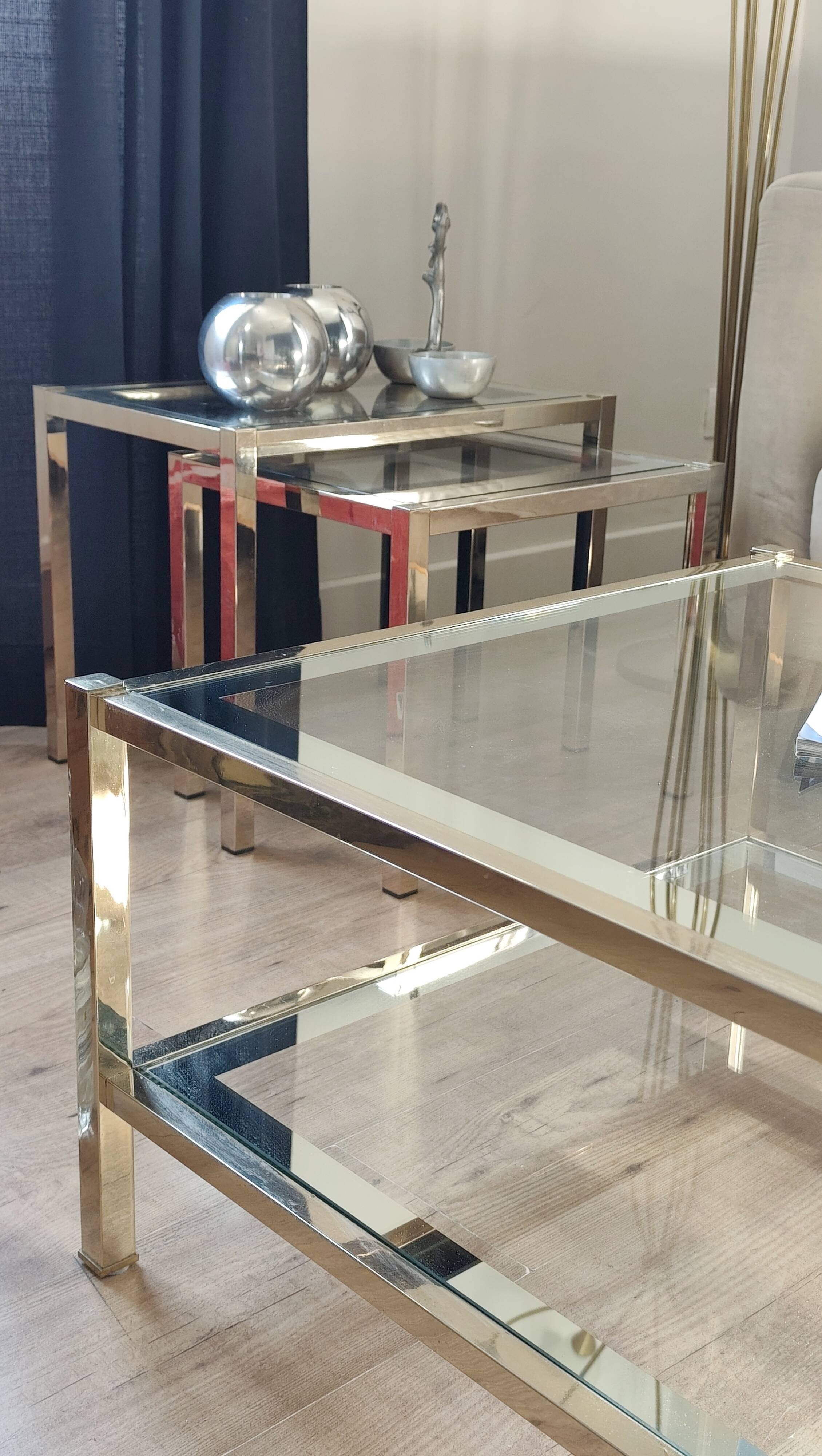 Vintage coffee table with glass, mirror, and brass.