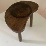 Antique tripod farm stool in brutalist style