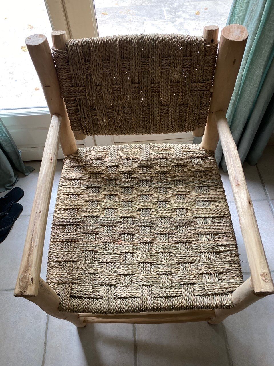 Handcrafted driftwood and straw armchair