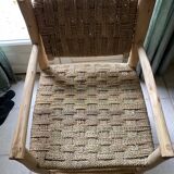 Handcrafted driftwood and straw armchair