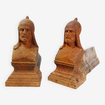 Pair of old cast iron andirons with genghis khan bust decoration