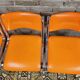 Set de 4 chaises chromées skaï orange 1970 vintage