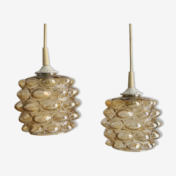 Two amber bubble glass hanging lamps