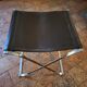 Tabouret pliant en acier et cuir