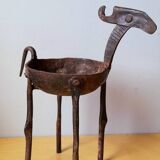 Zoomorphic wrought iron pocket emptier