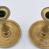 Pair of gossip candle holders in bronze and brass gilded period