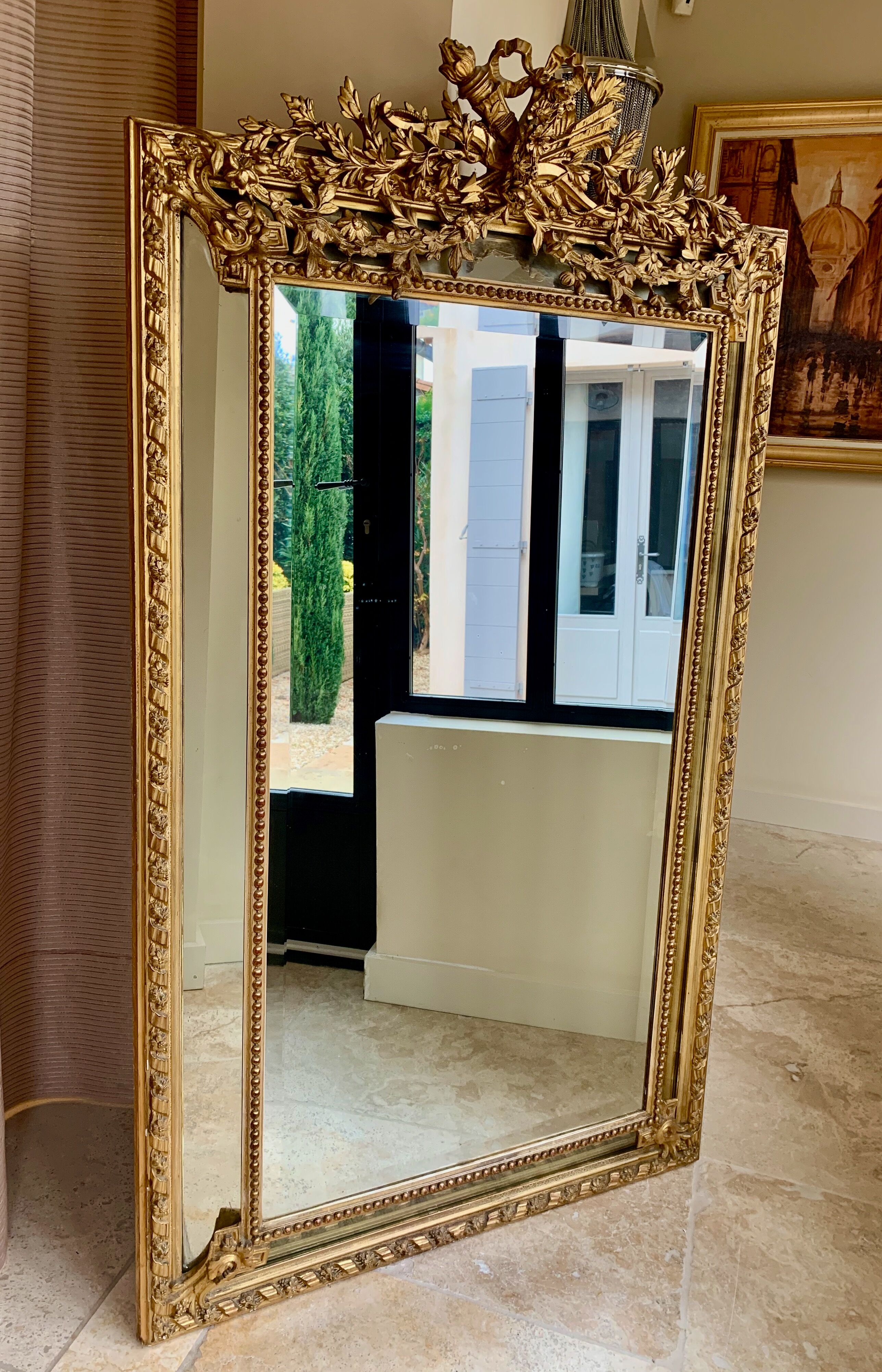 Large mirror style Louis XVI in gilded wood with parecloses xixth h: 165 cm