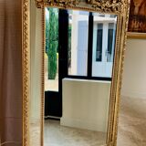 Large mirror style Louis XVI in gilded wood with parecloses xixth h: 165 cm