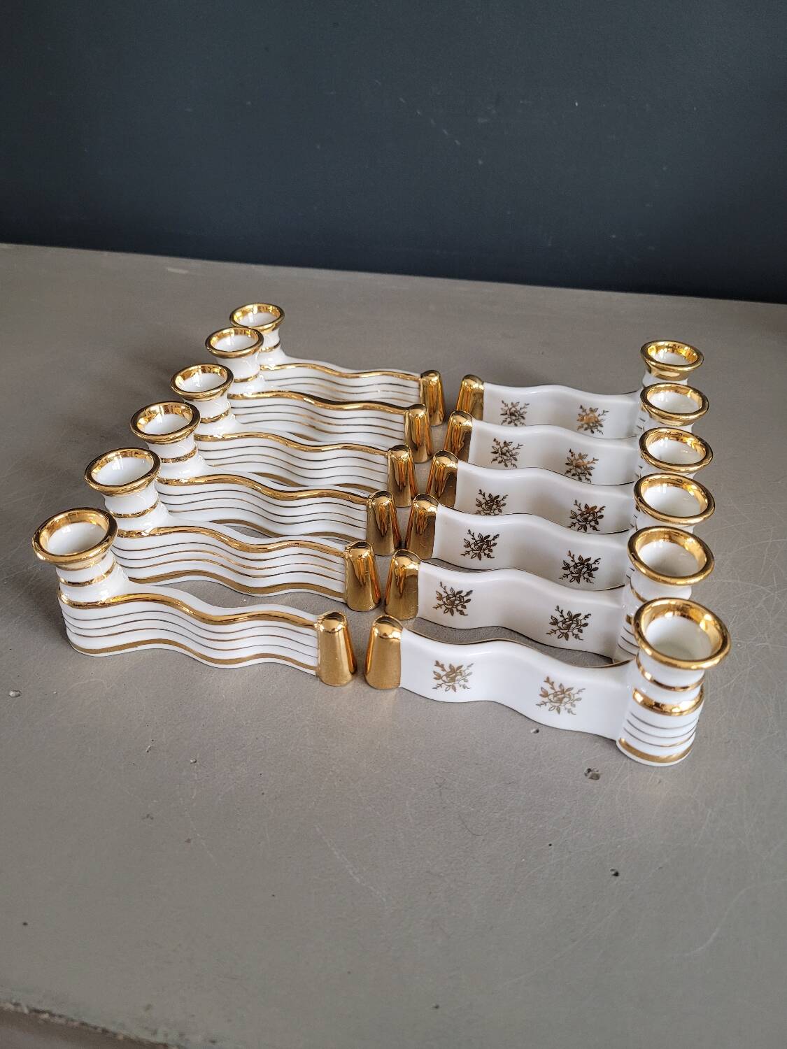12 Limoges art porcelain knife rests in their case
