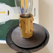 Wrought iron wall lights.