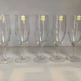 Five Luminarc champagne flutes