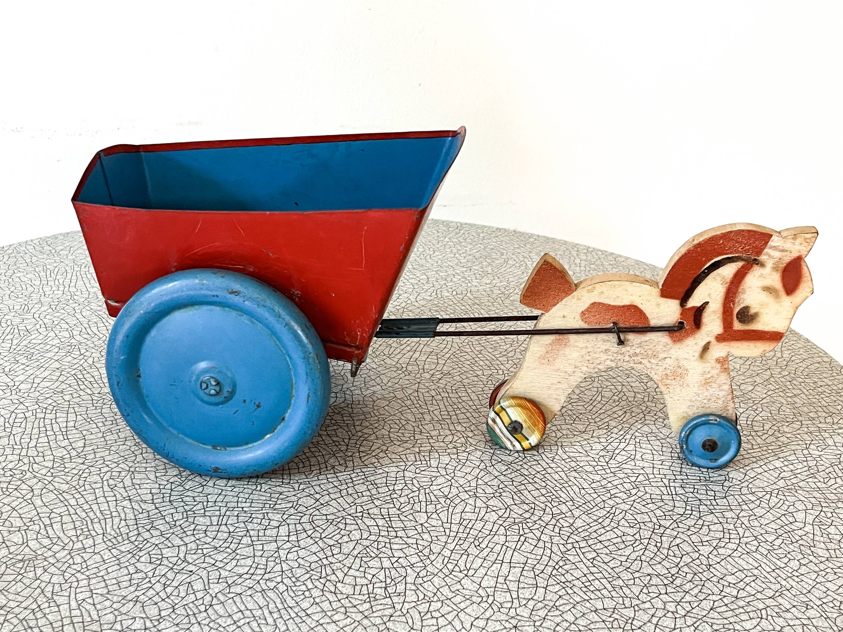 Horse cart and tin cart, old pull toy.