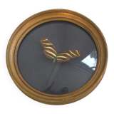 Butterfly frame under curved glass