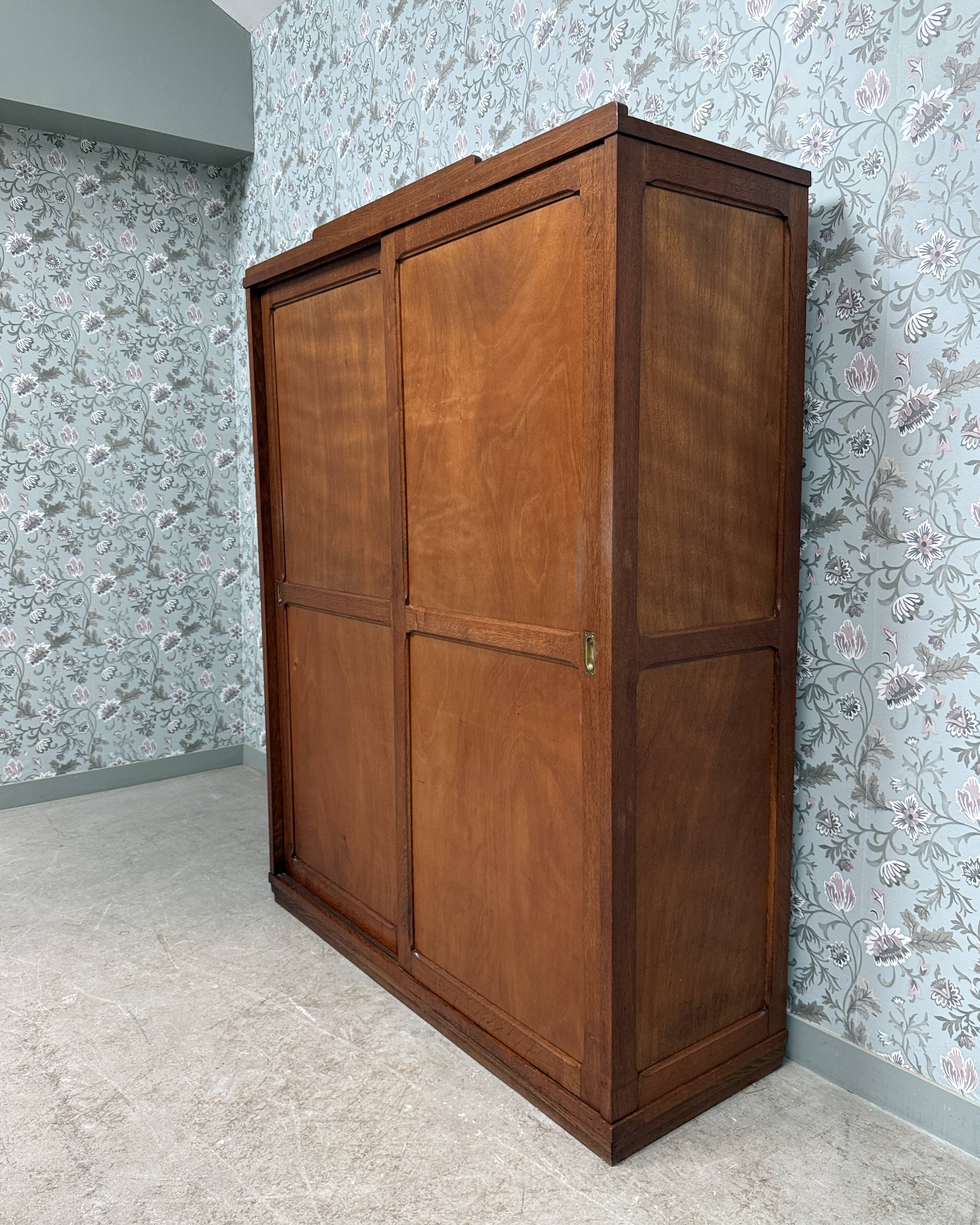 Large Parisian wardrobe with sliding doors