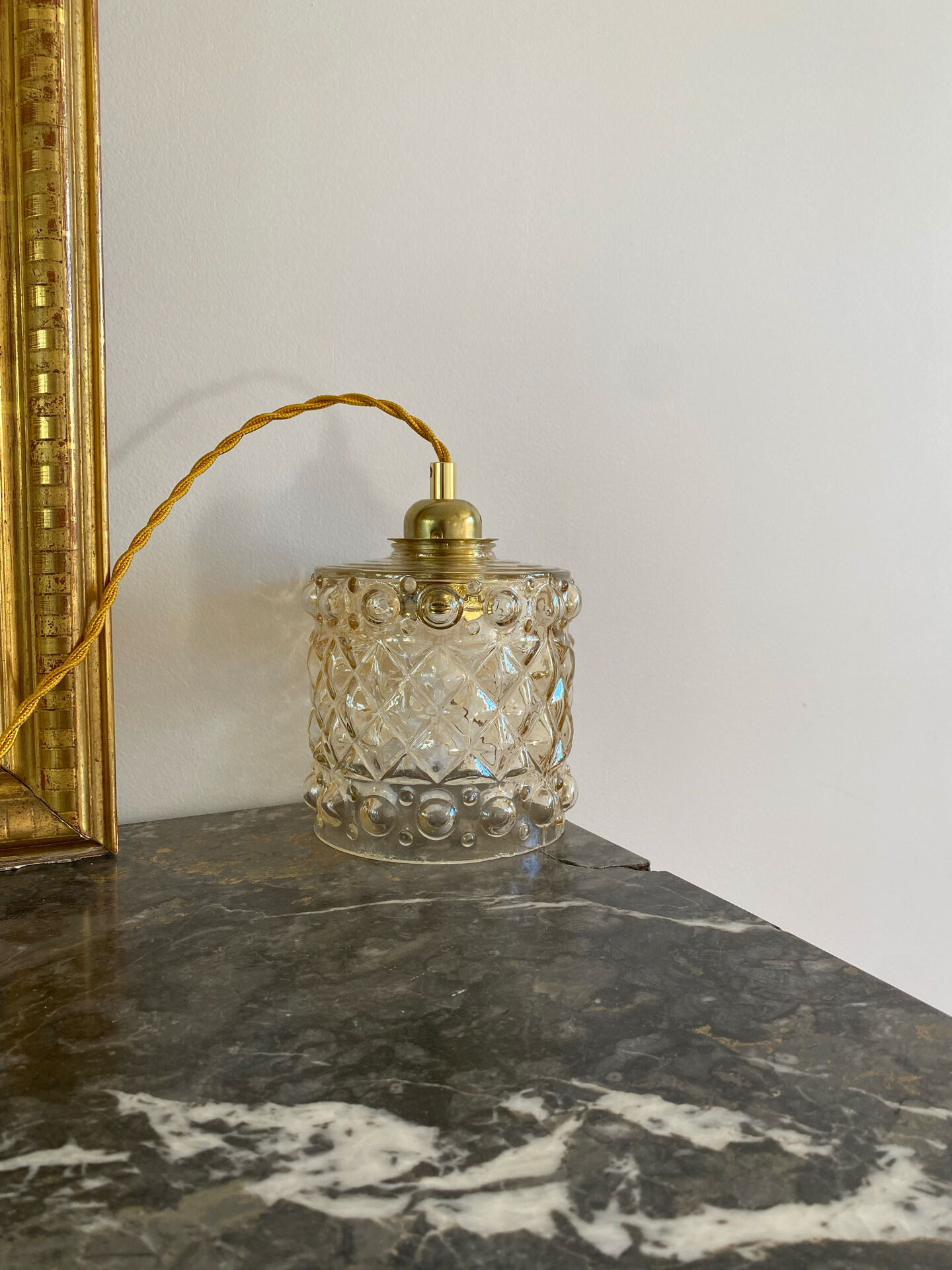 Vintage amber glass suspension globe