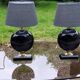 Pair of 70s designer lamps in black ceramic and gold metal