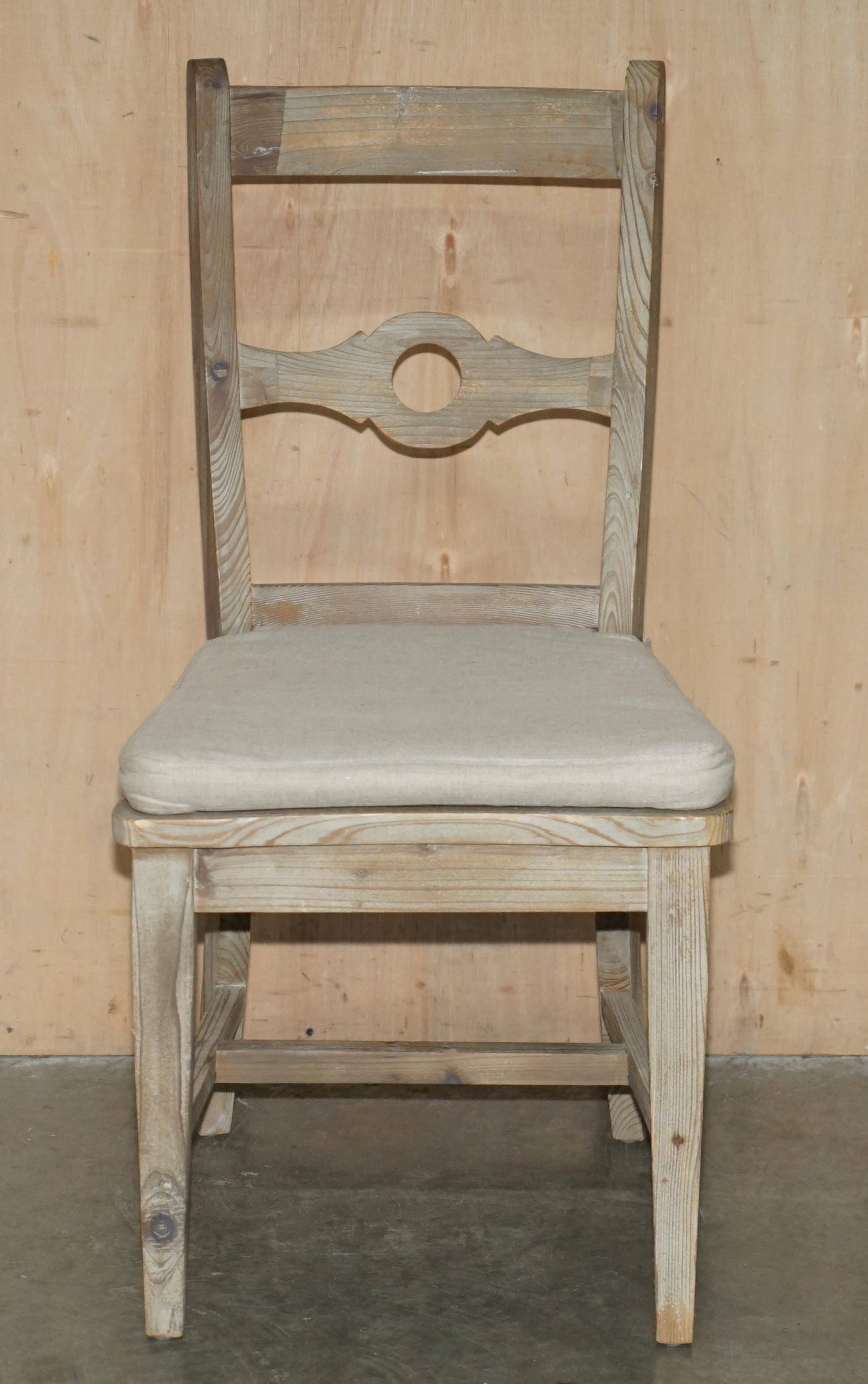 Pair of Swedish-style accent chairs in recycled pine with upholstered seats.