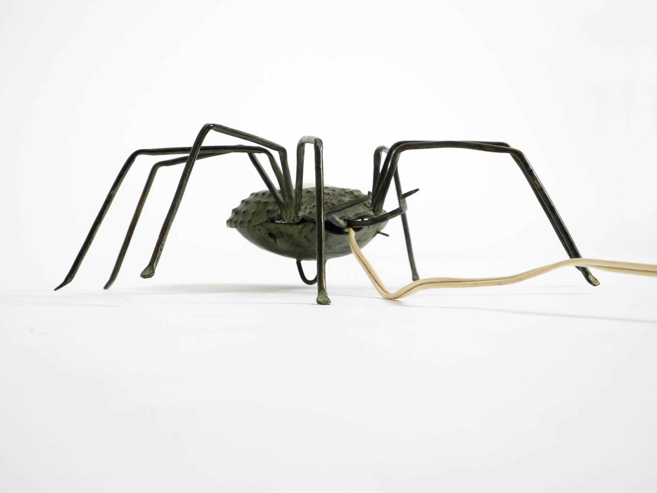 Beautiful Italian Mid Century Modern "Spider" wall lamp made of metal