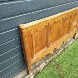 antique headboard in cherry wood