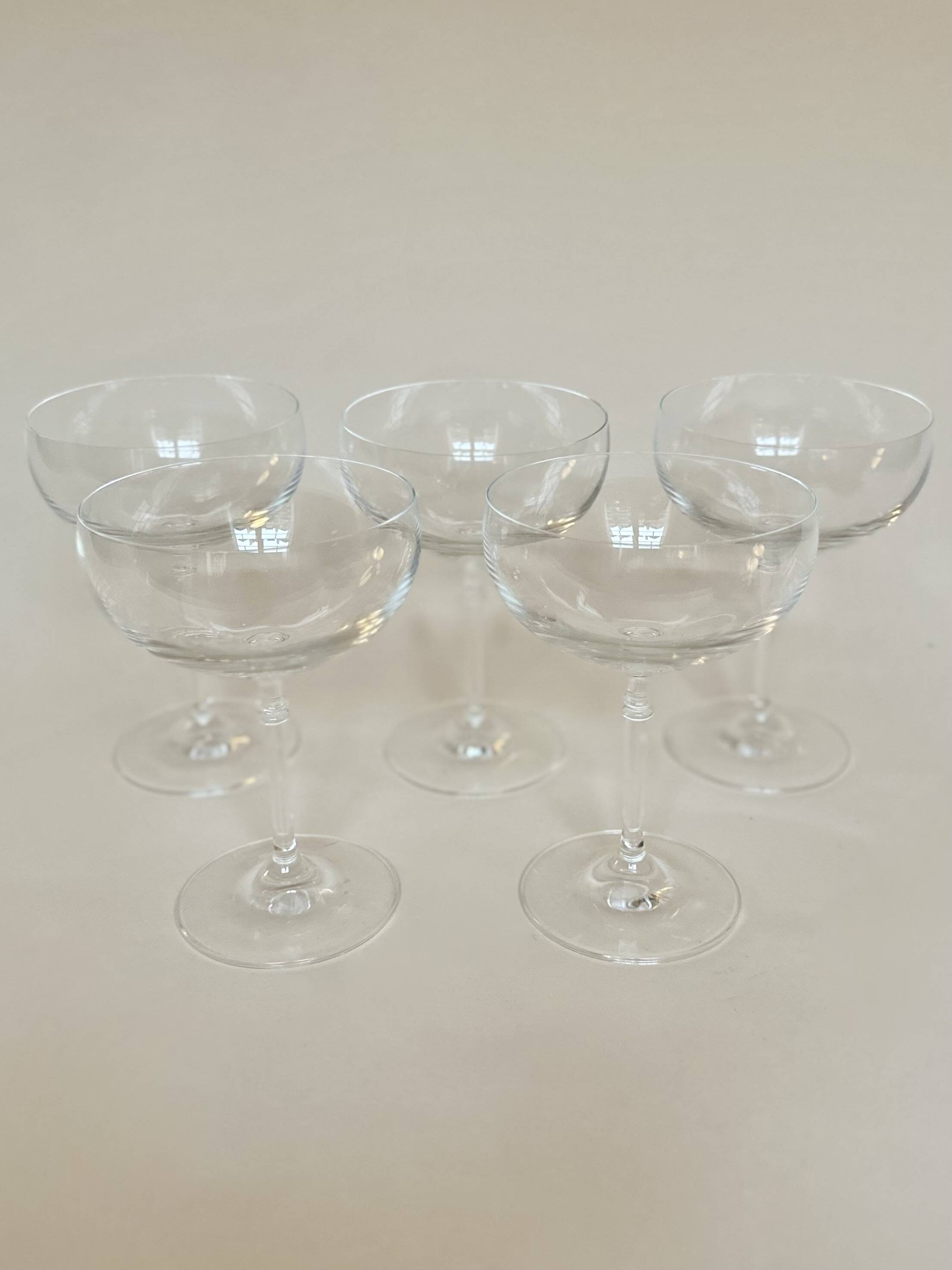 Set of five champagne glasses