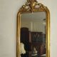 Gold wall mirror from the early 20th century.